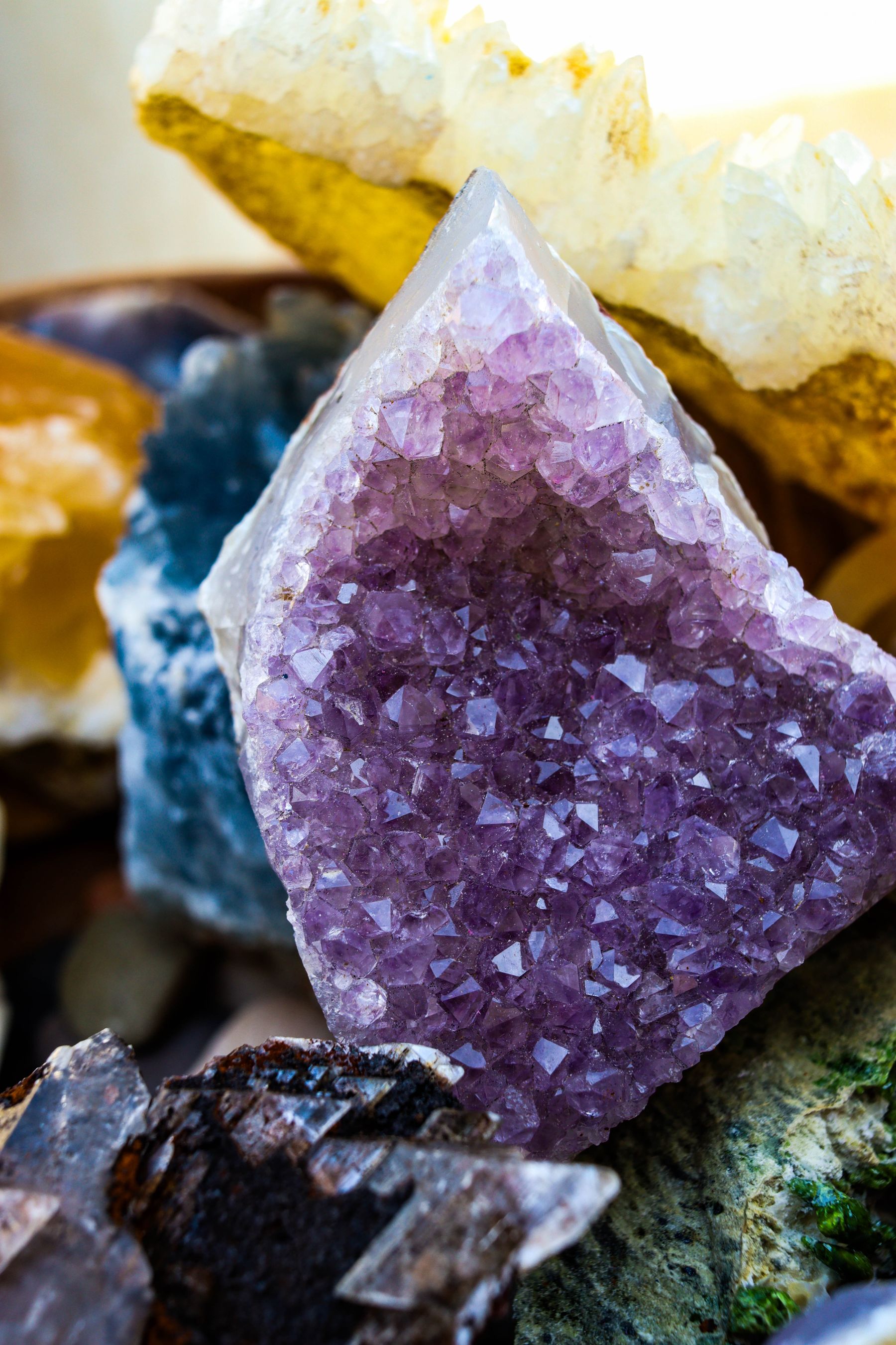 A cluster of deep purple amethyst crystals